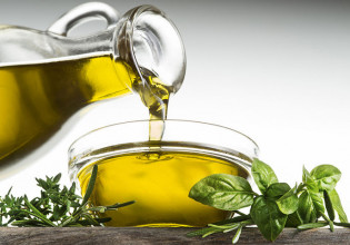 Why do Greeks eat less extra virgin olive oil?