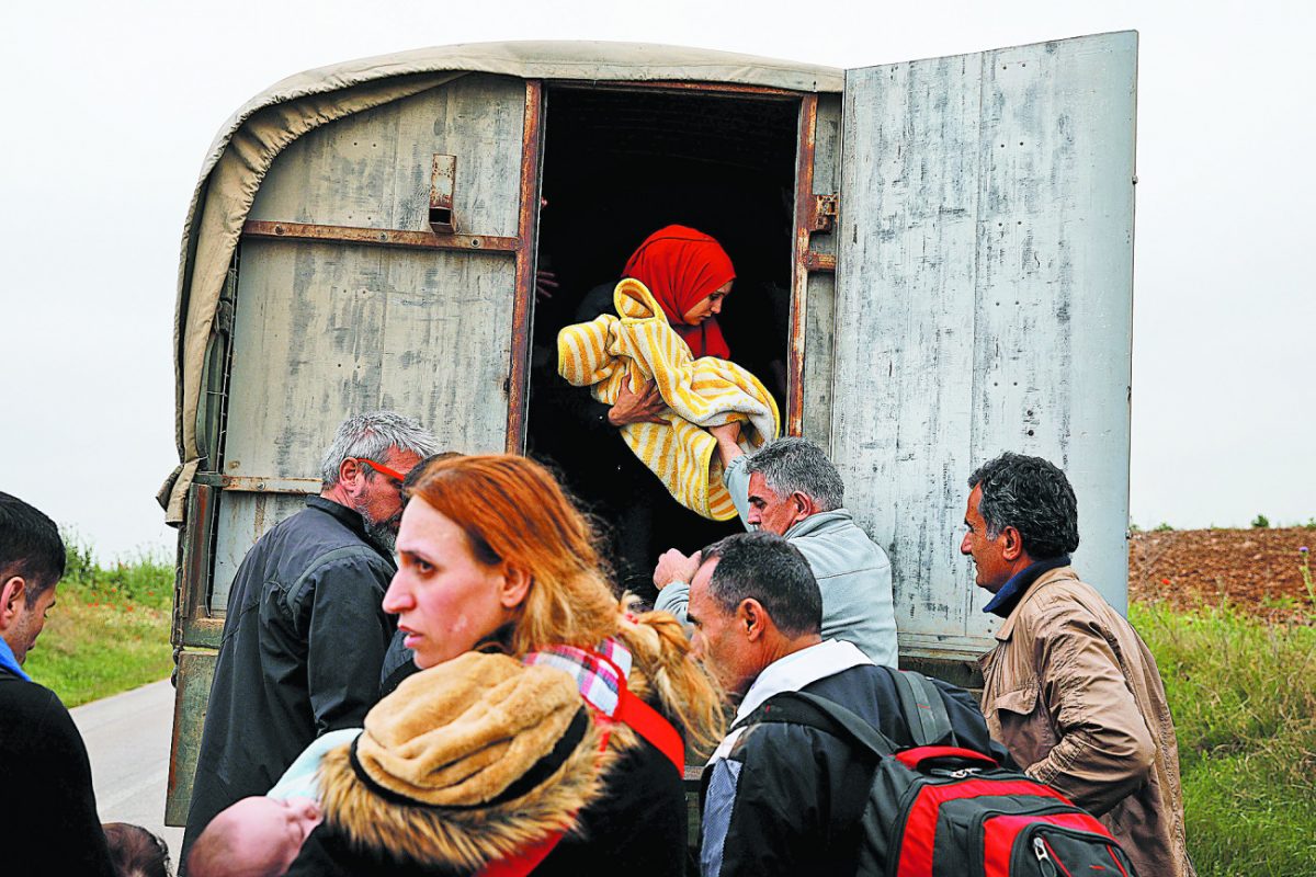 Πρόσφυγες από τη Συρία φτάνουν στον Έβρο τον Μάιο του 2018. 